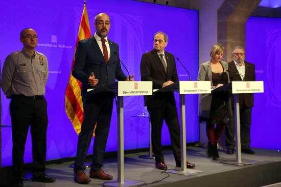 Image of the home affairs minister, Miquel Buch, the Catalan president, Quim Torra, and the health minister, Alba Vergés, on March 11, 2020 (by Maria Belmez)